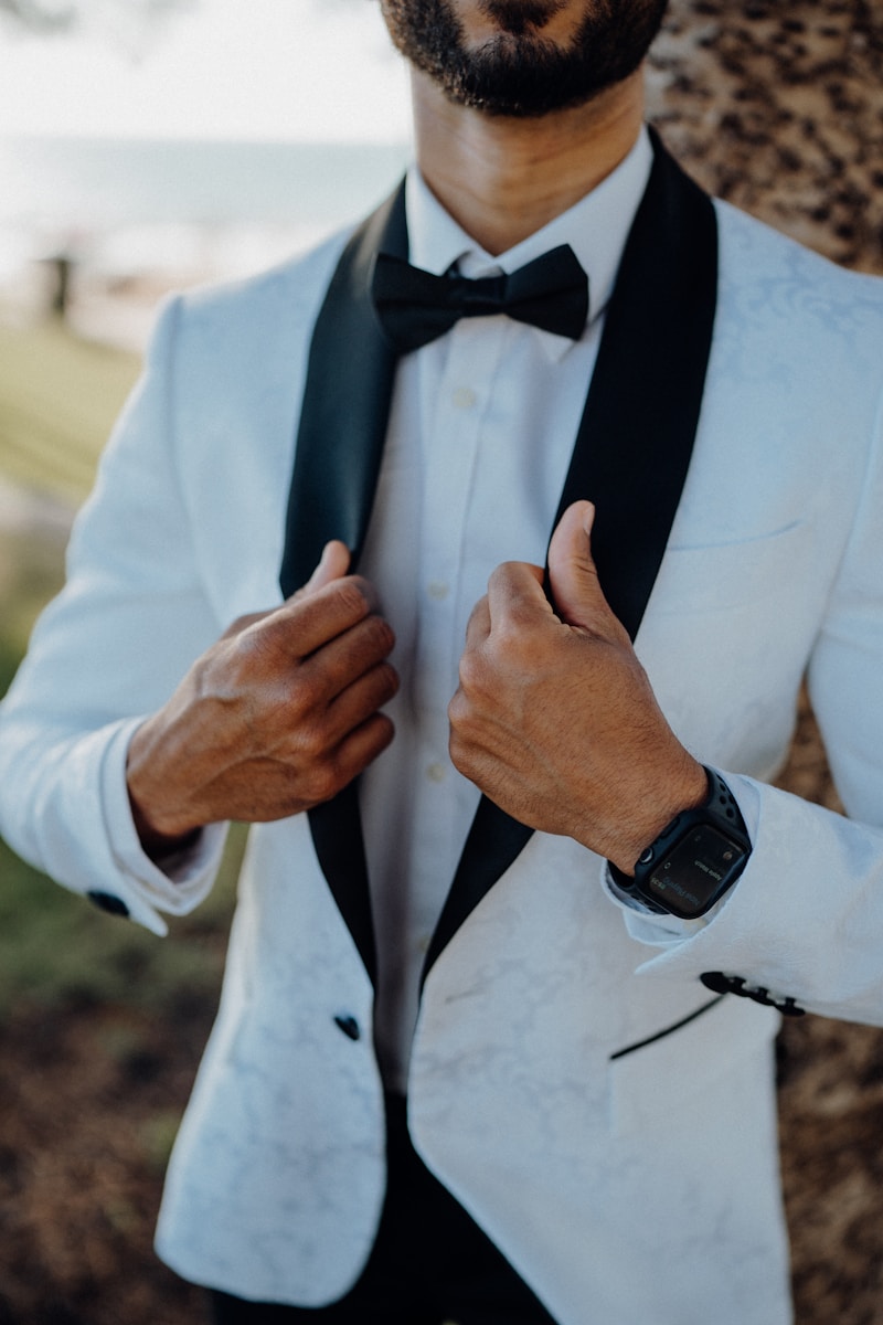Man in a white tuxedo with black lapels